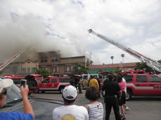 City firefighters are battling a blaze in 1000 block of University Avenue in Hillcrest, Wednesday, July 6, 2011