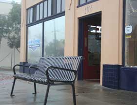 New bench in front of L.B. Powers & Sons Plumbing building (West Lewis & Stephens), December 20, 2010